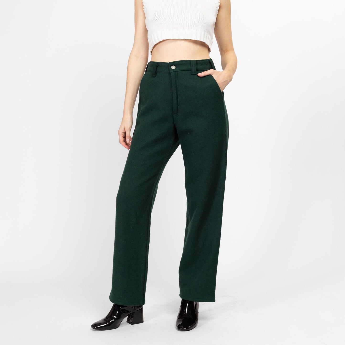 Bodega Vintage forest green wool trousers on model, high waist tapered leg