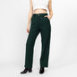 Bodega Vintage forest green wool trousers on model, high waist tapered leg